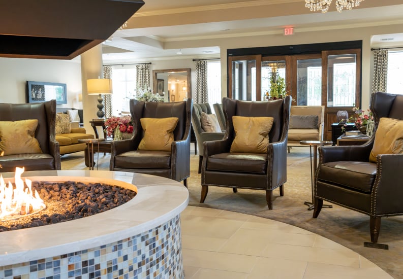 Wingback Chairs Around Fire Pit at Independent Living Facility Wingback Chairs Around Fire Pit at Independent Living Facility