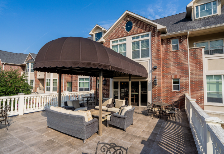 Outdoor Covered Patio Seating at Independent Living Facility Outdoor Covered Patio Seating at Independent Living Facility