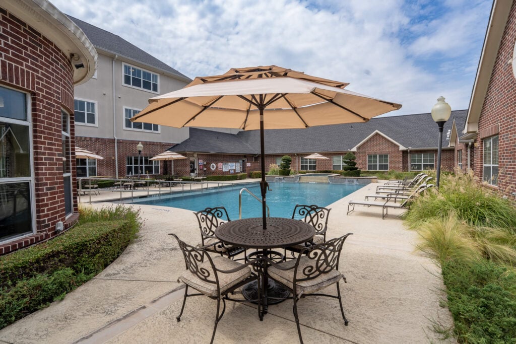 Outdoor Pool and Patio at Independent Living Facility