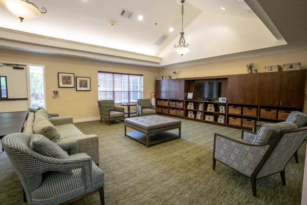 Community Lounge With Shelving at Memory Care Facility