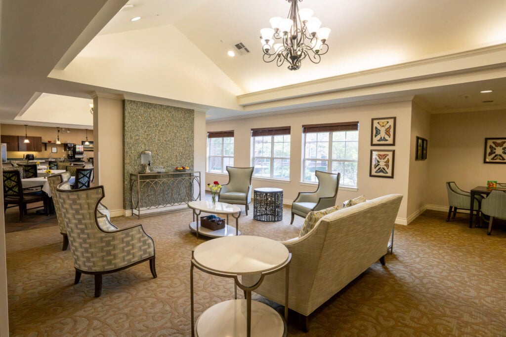 Community Sitting Room With Chandelier at Memory Care Facility