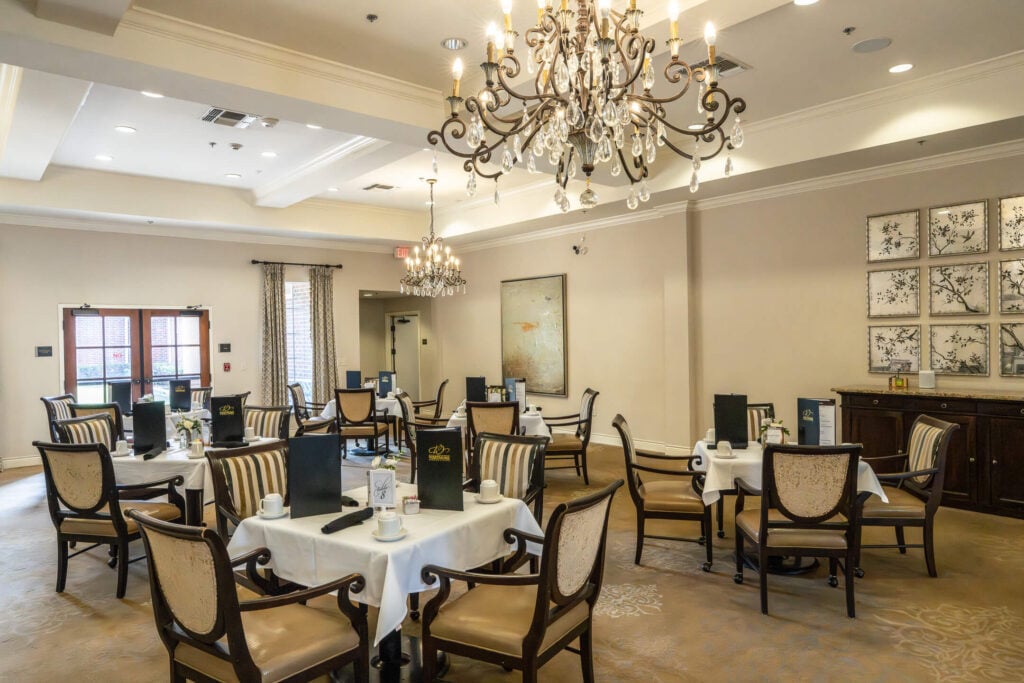 Formal Dining Space With Chandeliers at Assisted Living Facility
